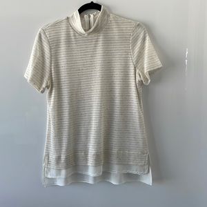 Women’s short sleeve mock turtleneck shirt.